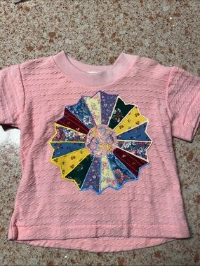 Handcrafted 12M jersey with pressed on fabric & fabric paint